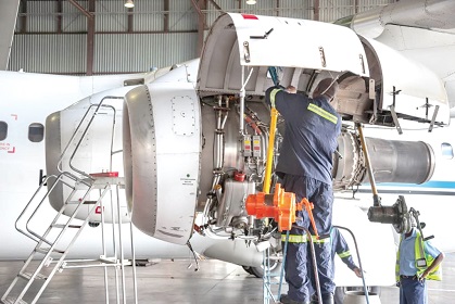 An aircraft being serviced at MRO facility 